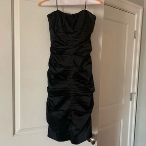Like new strapless black dress by Nicole Miller Collection size 8